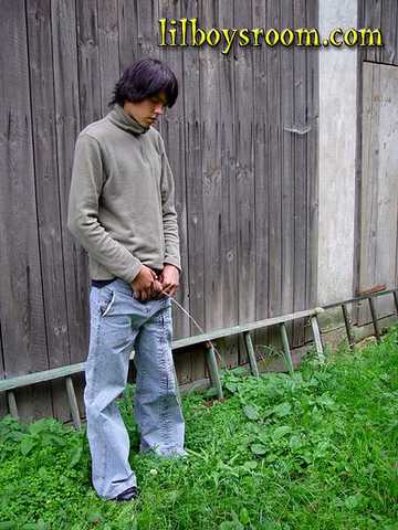 cute_boy_makes_pee-pee_behind_the_barn.jpg