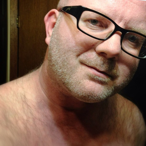 baldwithglasses.jpg